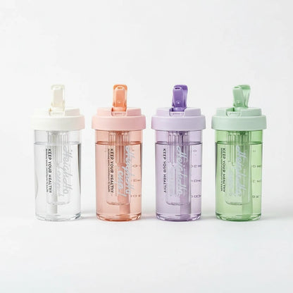 Havefy pastel fruit infuser water bottles in white, pink, purple, and green with built-in straws and infuser cores.